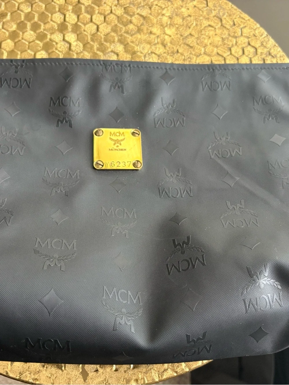 MCM Black Embossed Logo Toiletry Bag with Gold Plaque